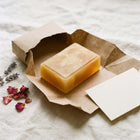 Nivam Turmeric & Coconut Milk soap wrapped in kraft paper