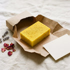 Nivam Turmeric & Coconut Milk soap wrapped in kraft paper
